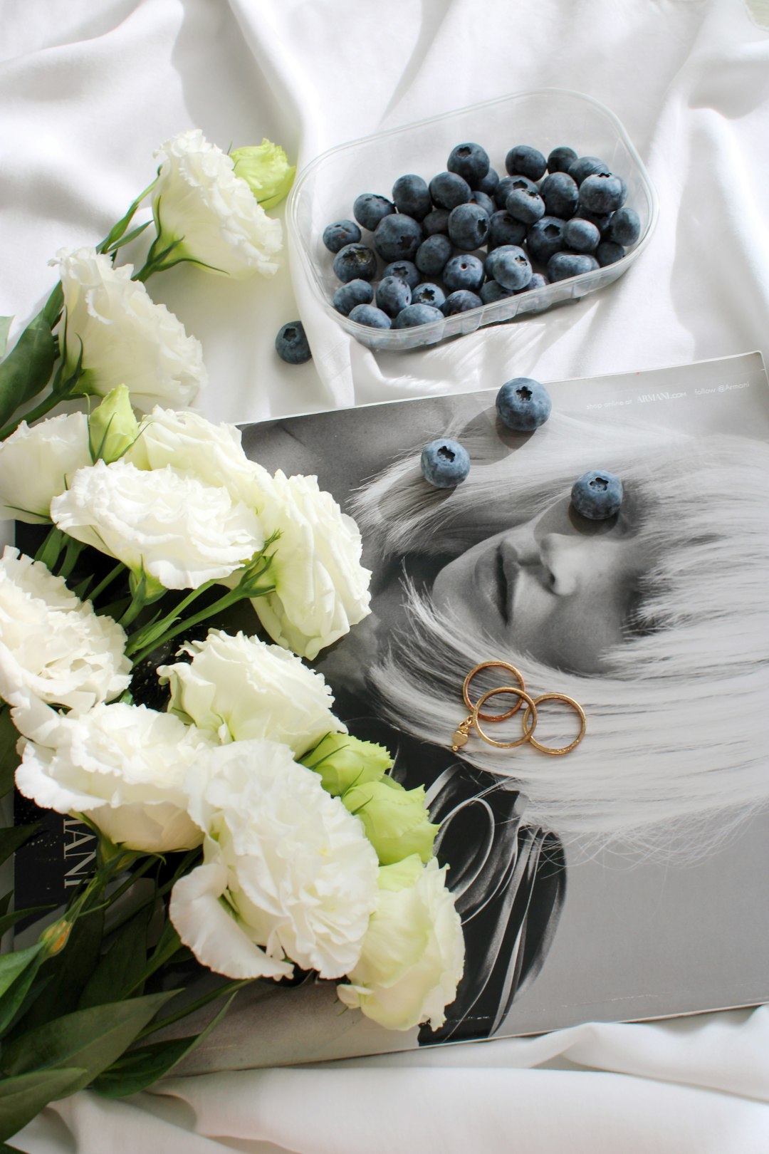 white flower bouquet on white table