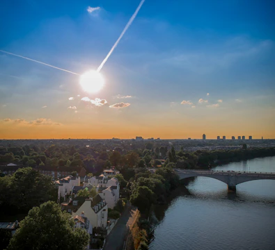 Sunset view over an ecopulse cleanup site showing a clean riverbank.