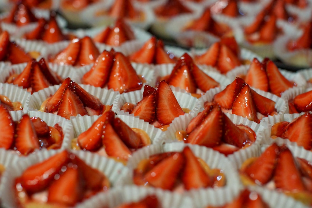 orange and white icing on white ceramic plate