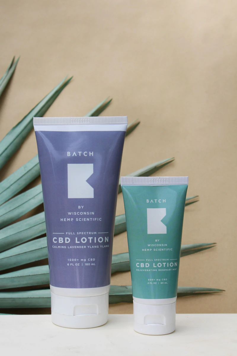 Hemp-infused body lotion jar with lavender sprigs