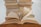 white book on brown wooden table