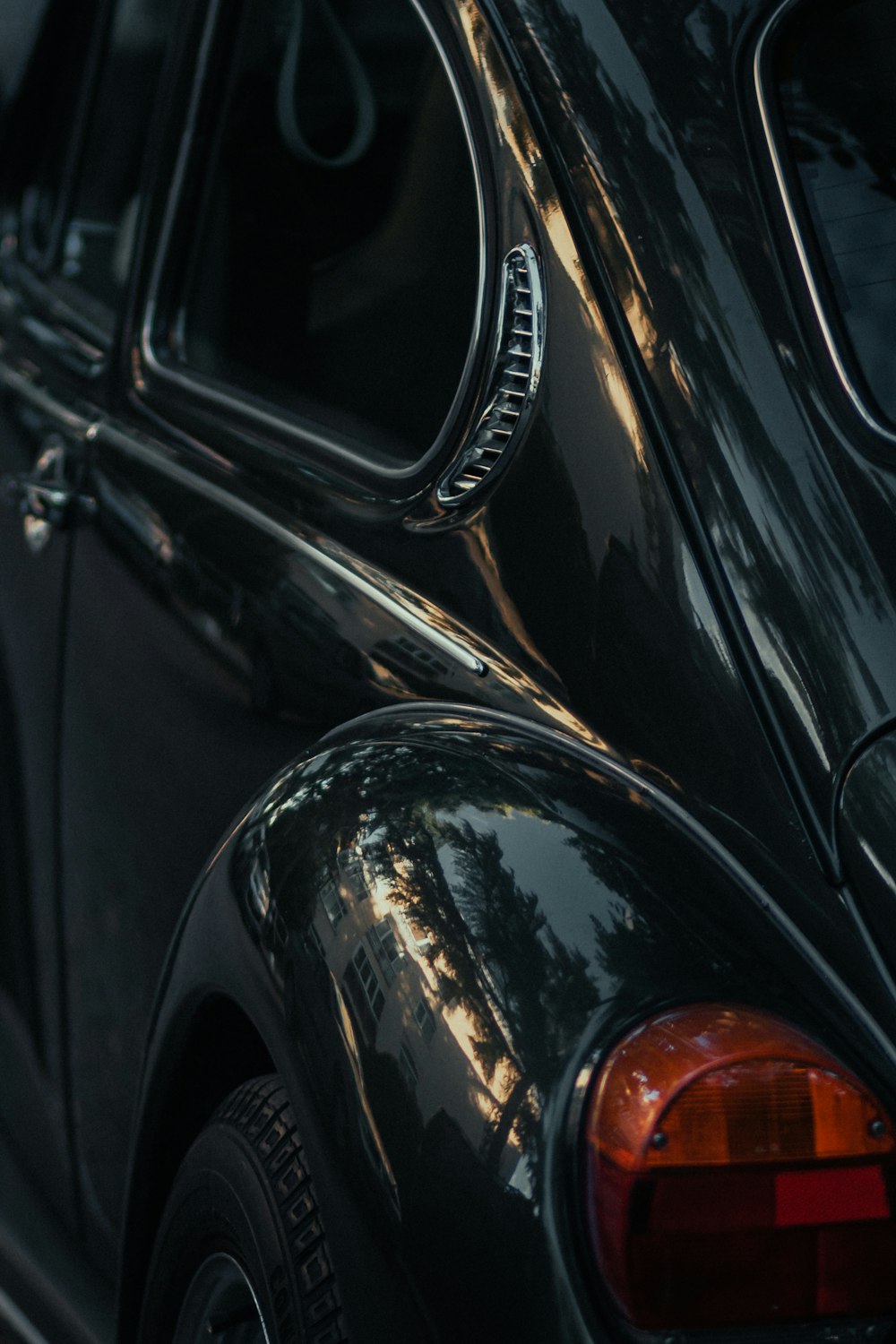 black car with red and silver headlight