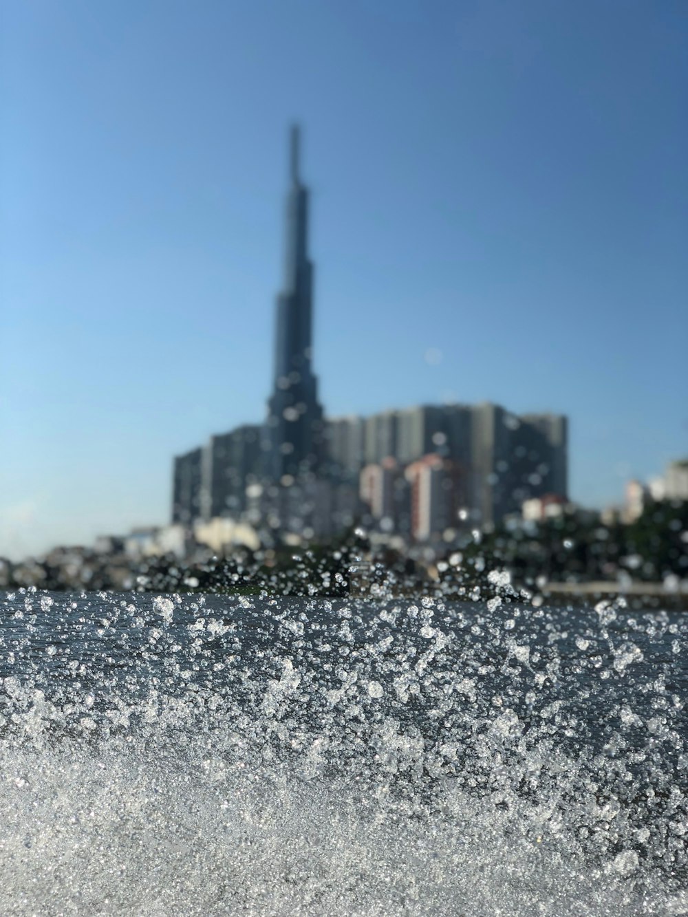 water splash on body of water during daytime