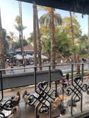 An inviting café terrace with people enjoying coffee.