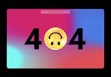 A stylized 404 error page features a bright, colorful gradient background with pink, blue, and purple hues. The number '404' is prominently displayed, with a yellow smiley face replacing the zero. The smiley face has an upside-down smile, giving a playful twist to the classic error message.