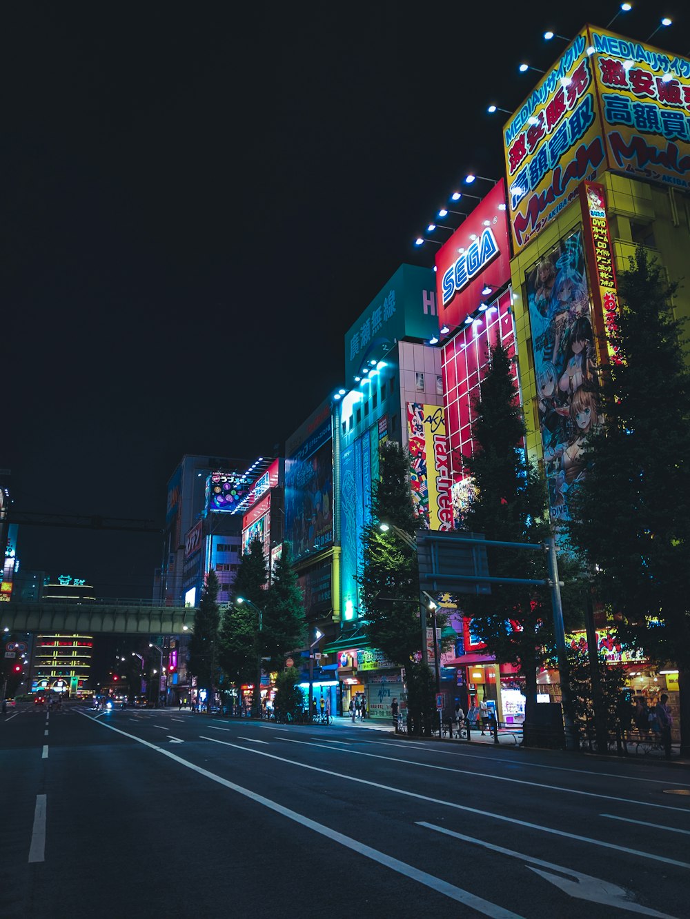 cars on road in city during night time