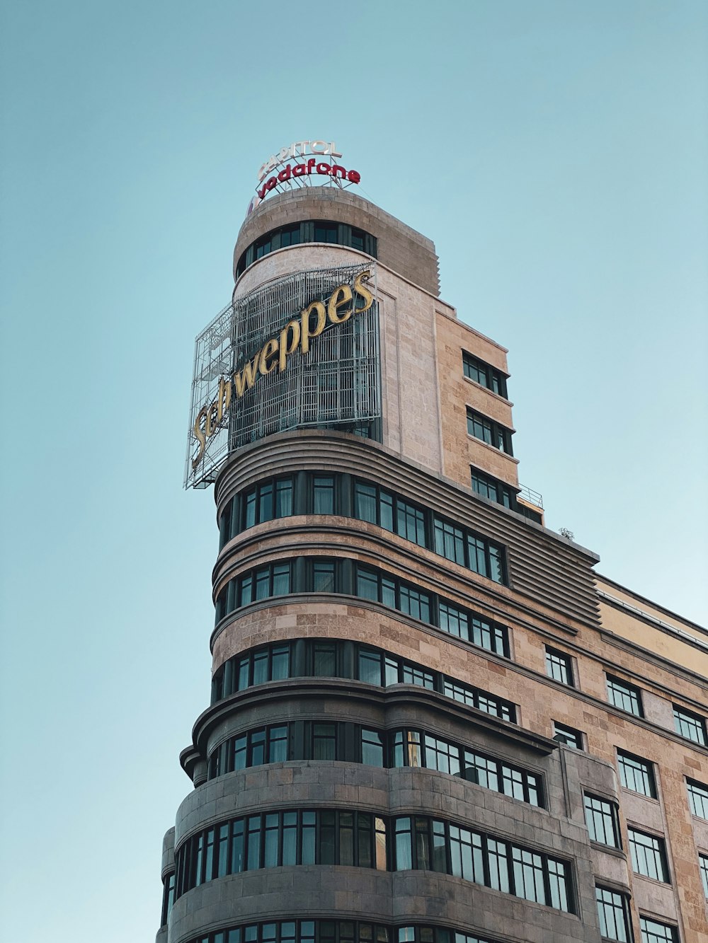 brown concrete building under blue sky during daytime