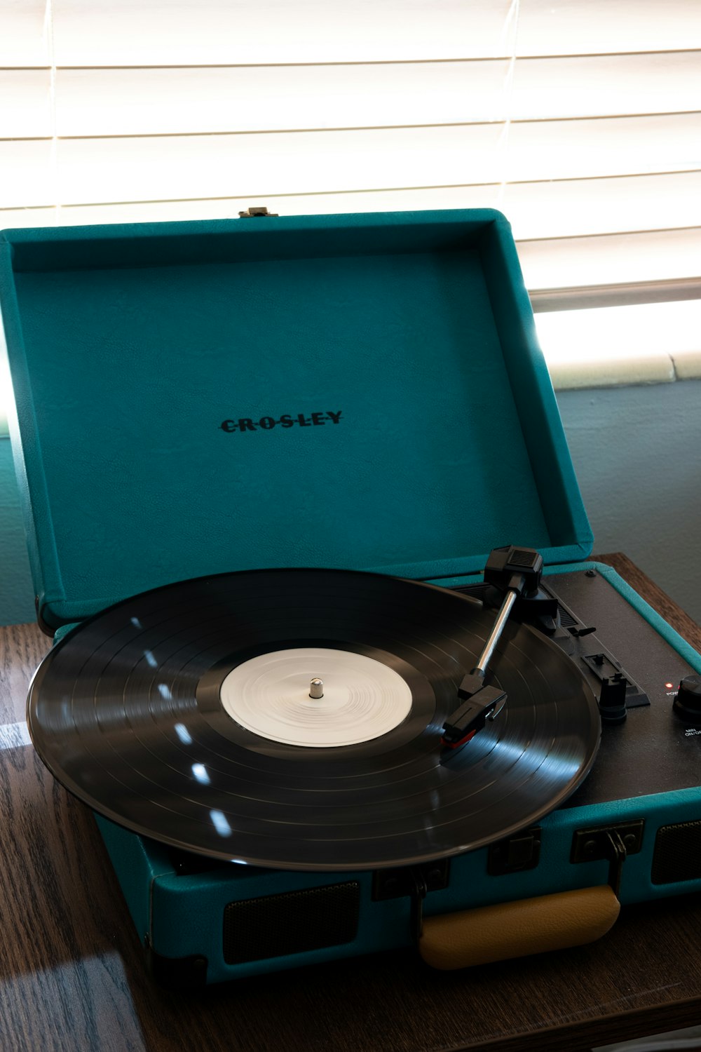blue and black vinyl record player