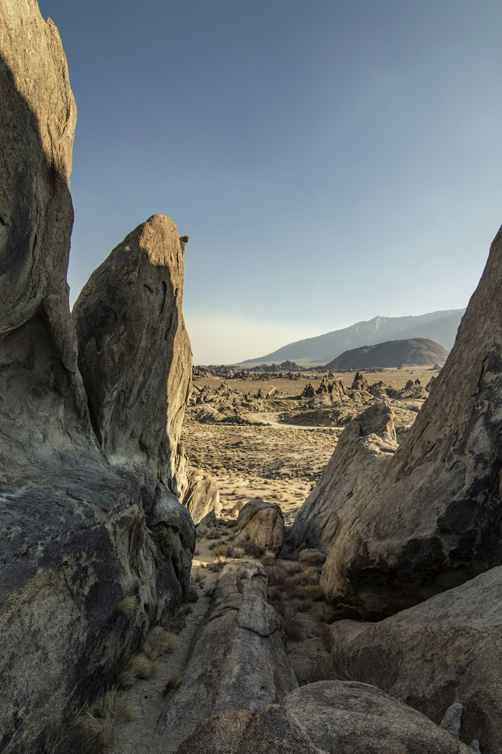 brown rocky mountain under blue sky during daytime