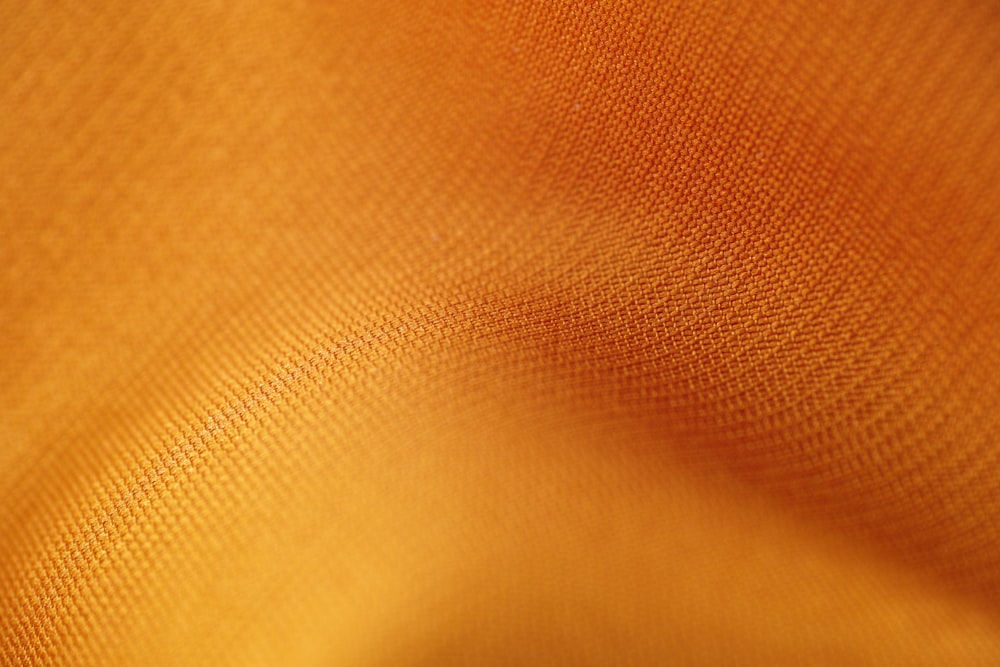 brown textile in close up photography