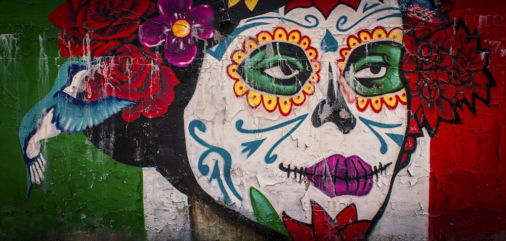 red and yellow flower on wall