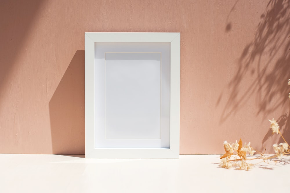 white wooden framed glass window