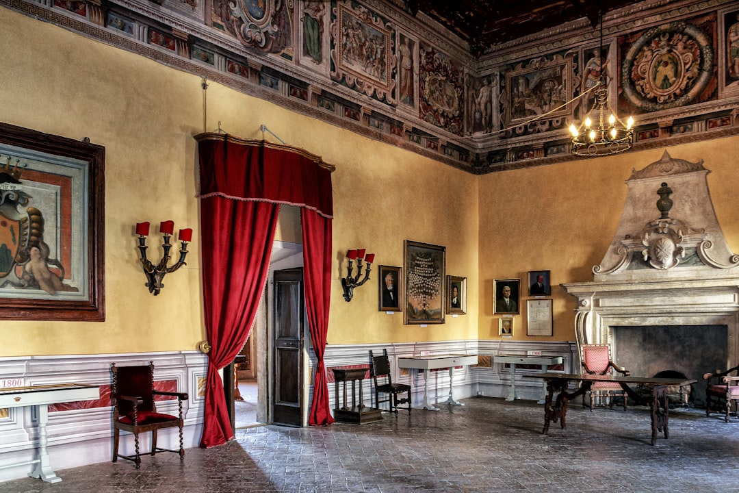red window curtain on window, elegant reception room of villa farantini