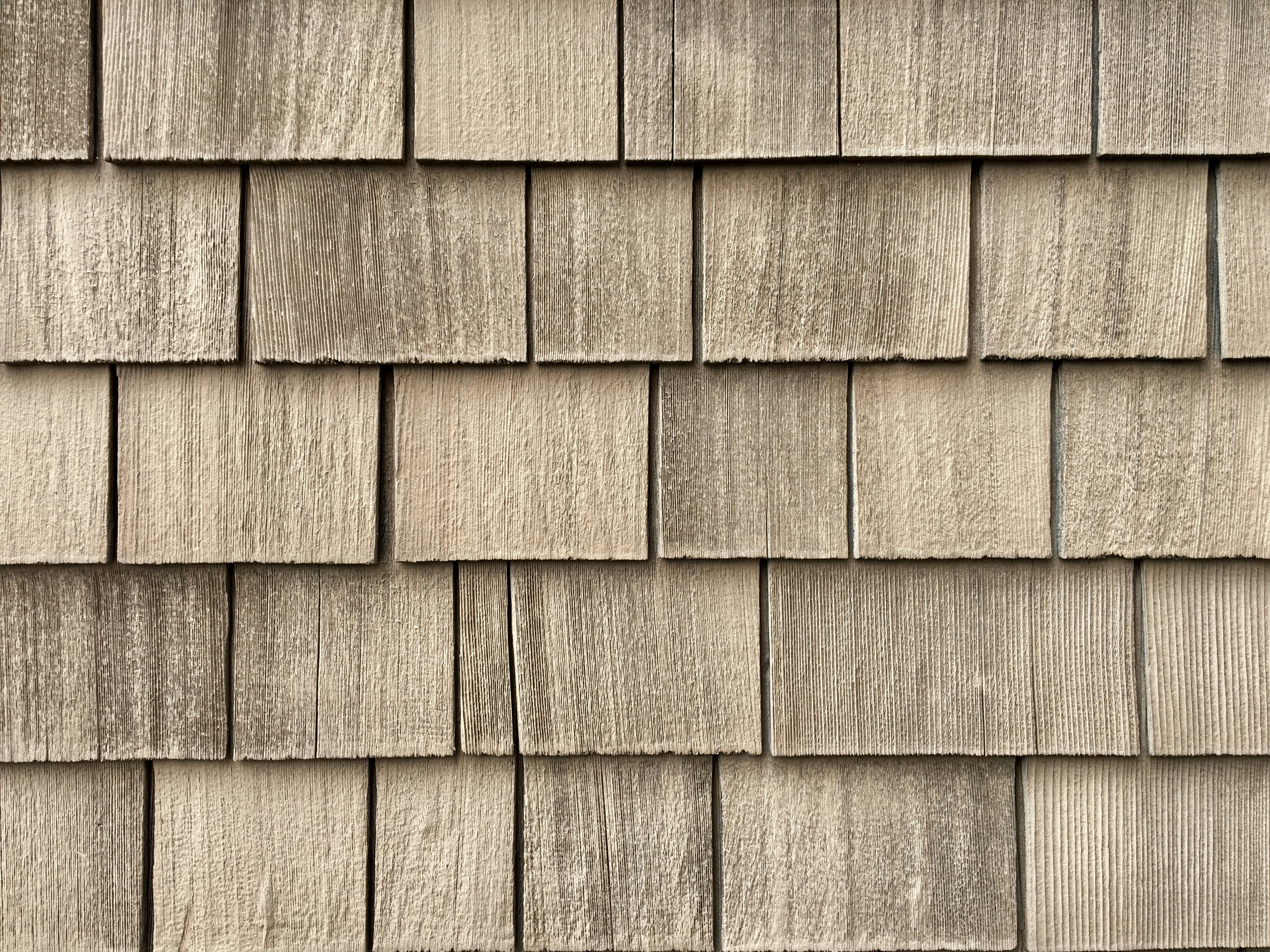 brown brick wall during daytime