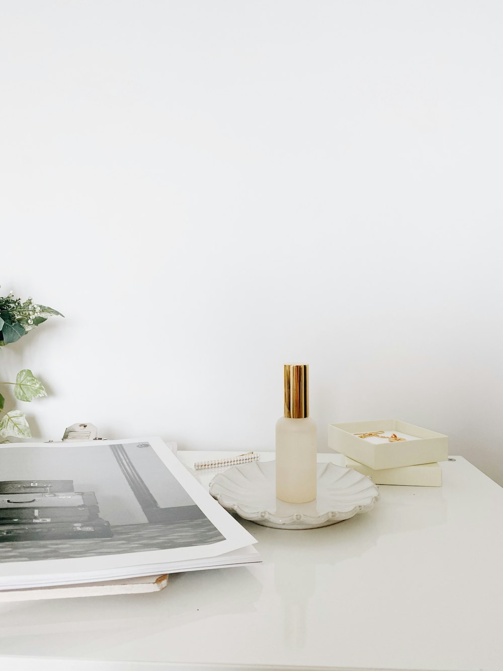 white ceramic mug on white table