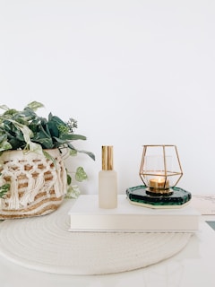 black and brown candle holder on white table