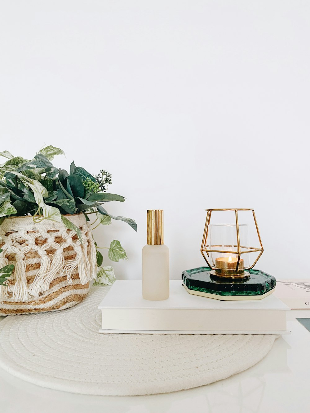 black and brown candle holder on white table