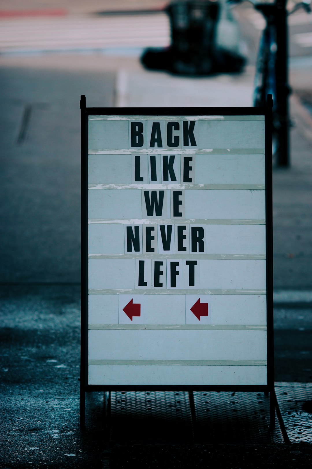 white and black wooden signage