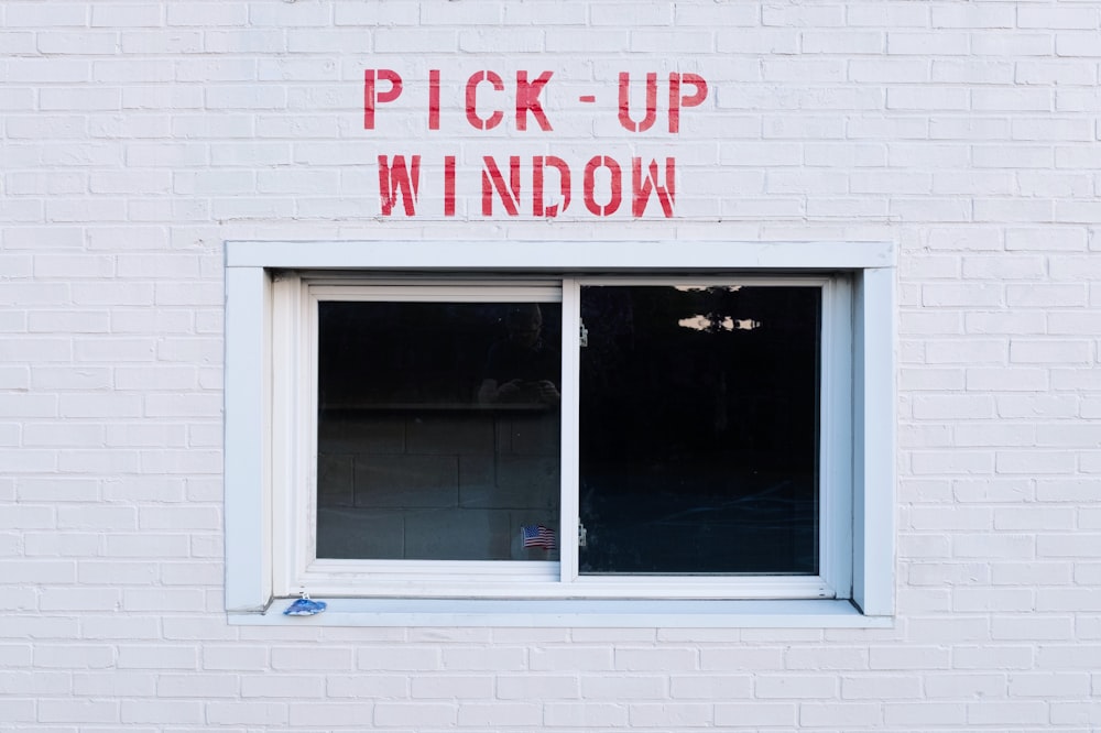 white wooden framed glass window