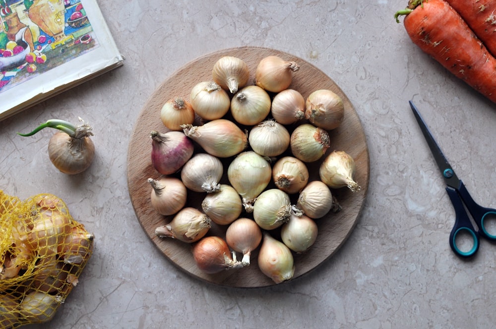 brown round fruit on brown round bowl