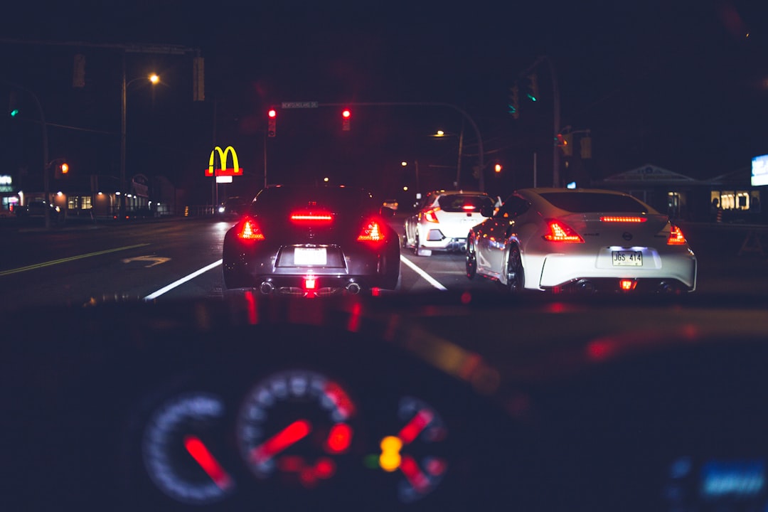 cars on road during night time