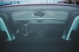 A sleek dash camera mounted inside a car capturing the road ahead