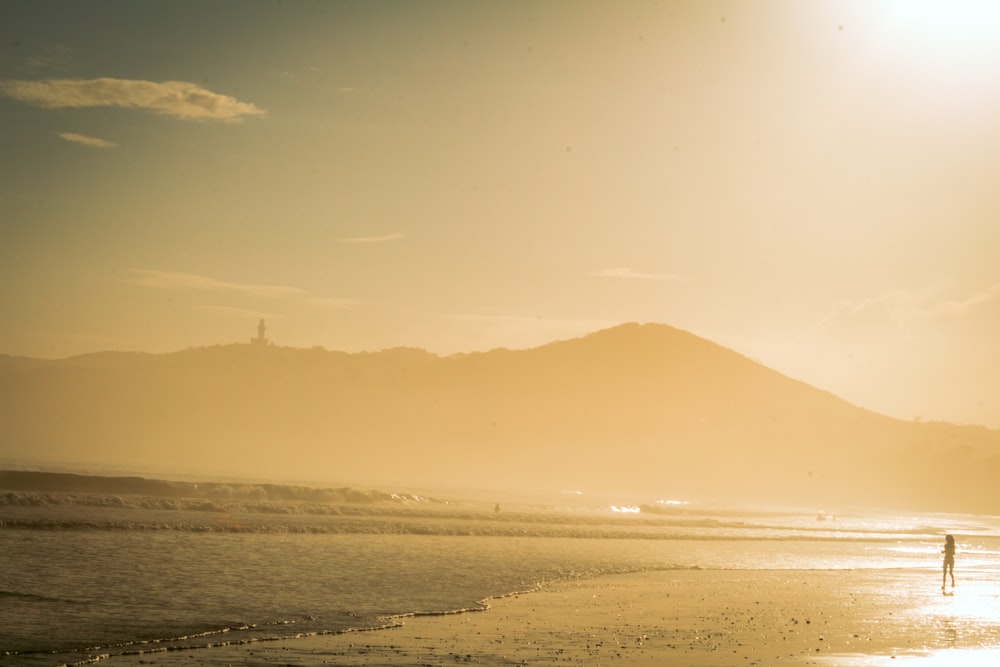 silhouette of mountain during daytime