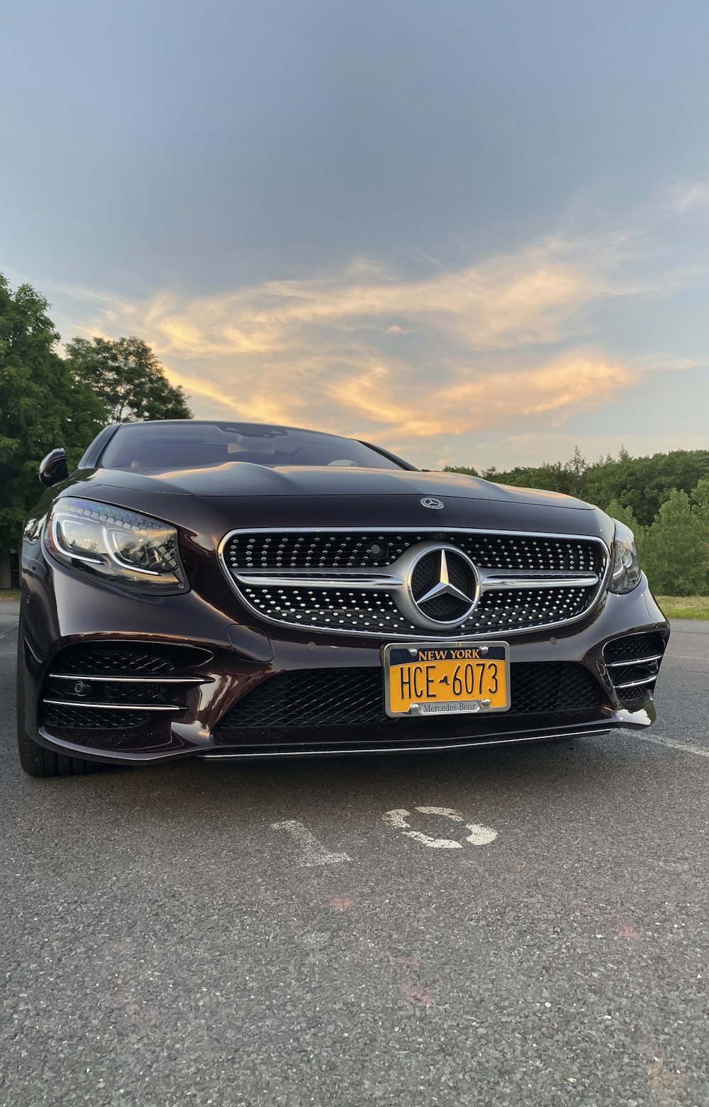 black mercedes benz car on road during daytime