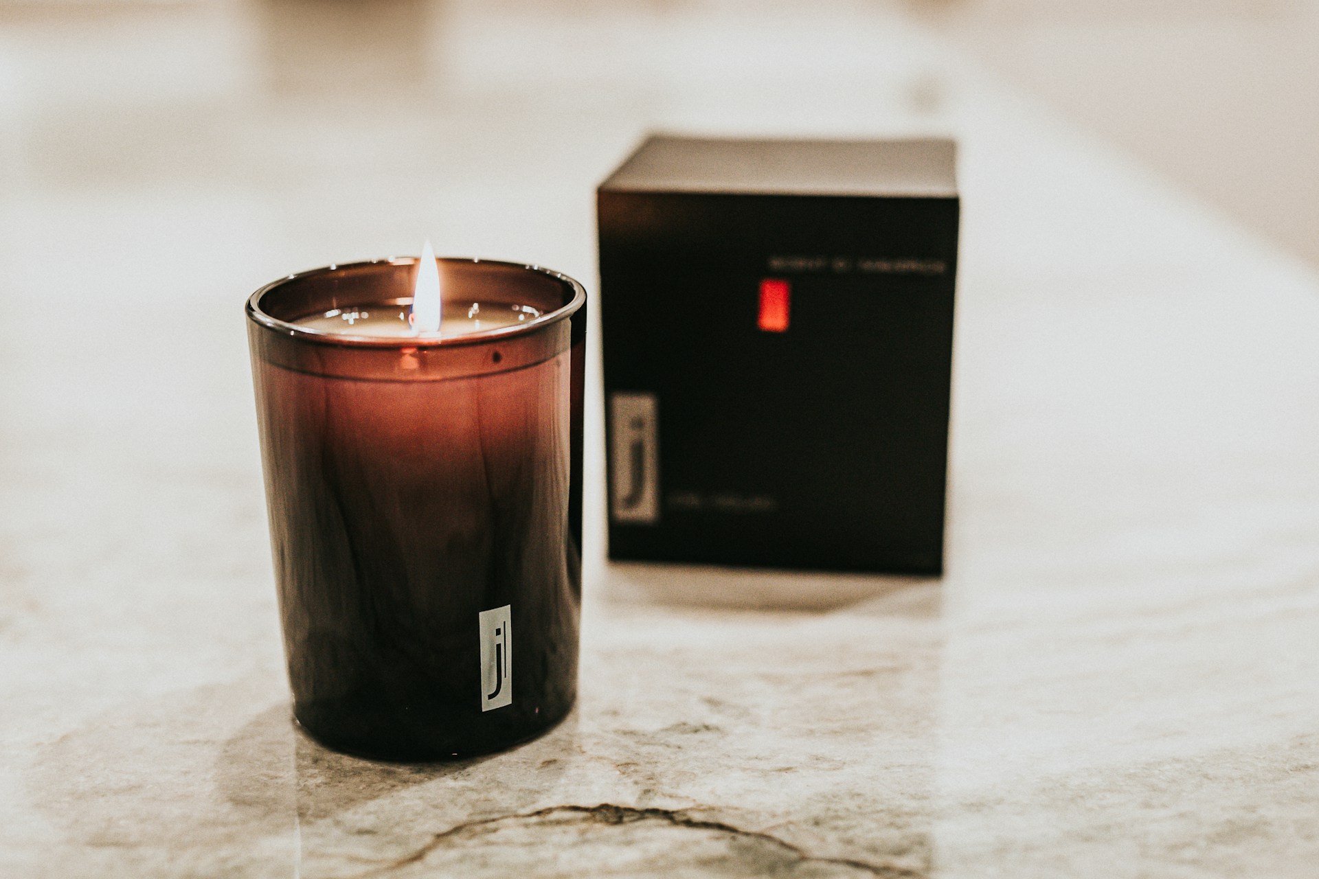 brown candle holder on white table
