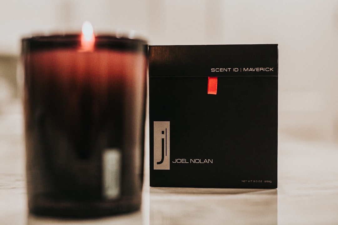 red candle in black box