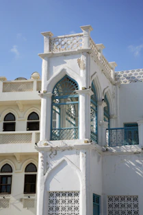 white concrete building under blue sky during daytime