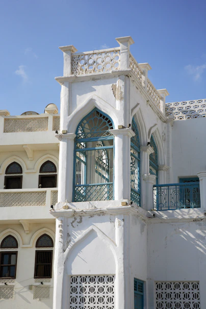 white concrete building under blue sky during daytime