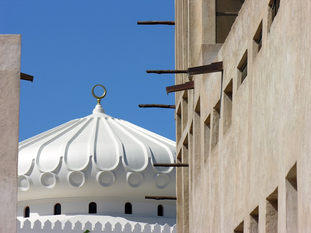 white concrete building under blue sky during daytime