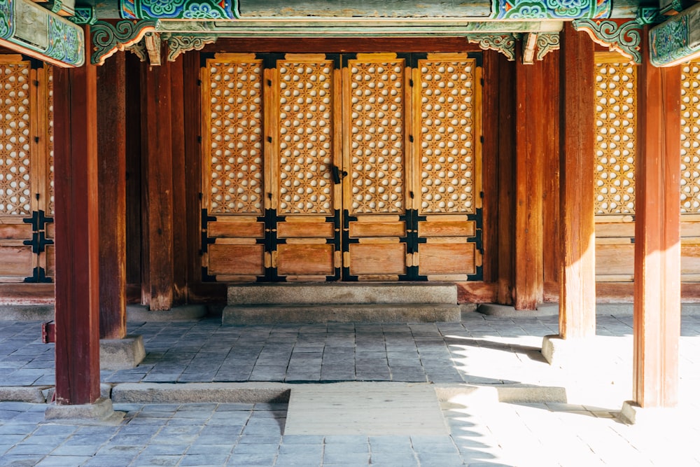 brown wooden gate on gray concrete floor