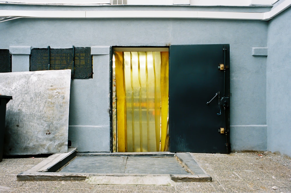 black and yellow wooden door