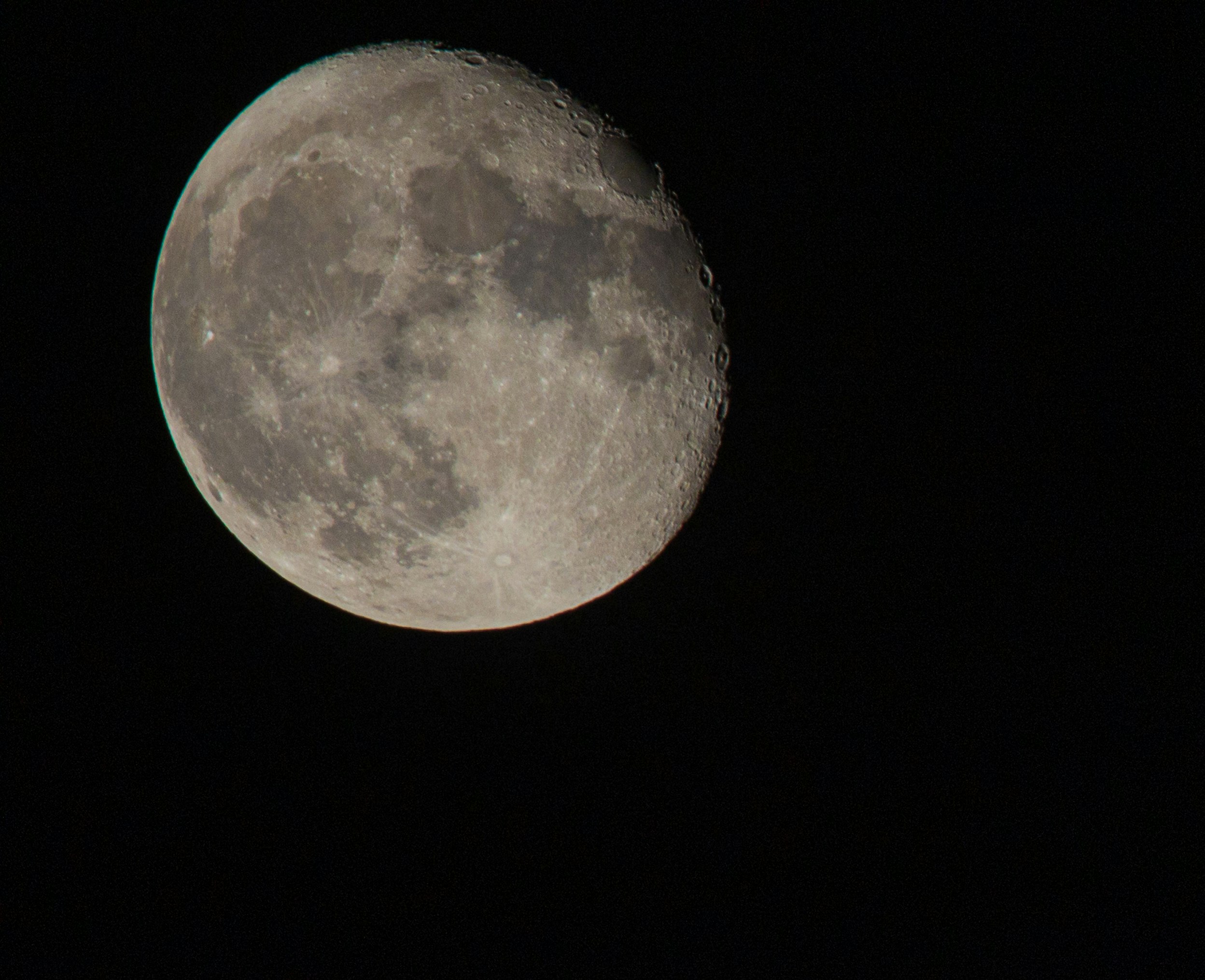 full moon in dark night sky