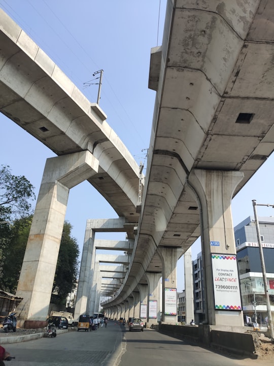 white concrete bridge during daytime in Hyderabad India