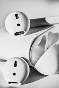 A close-up of gmd earbuds with a sleek design.