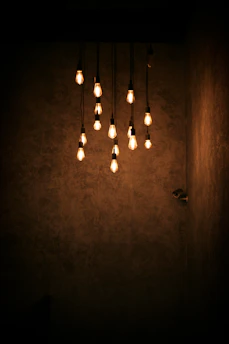 A cozy room softly lit by warm LED bulbs from Evolux Iluminação