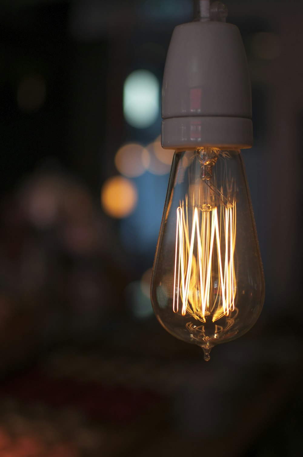 clear light bulb turned on in tilt shift lens