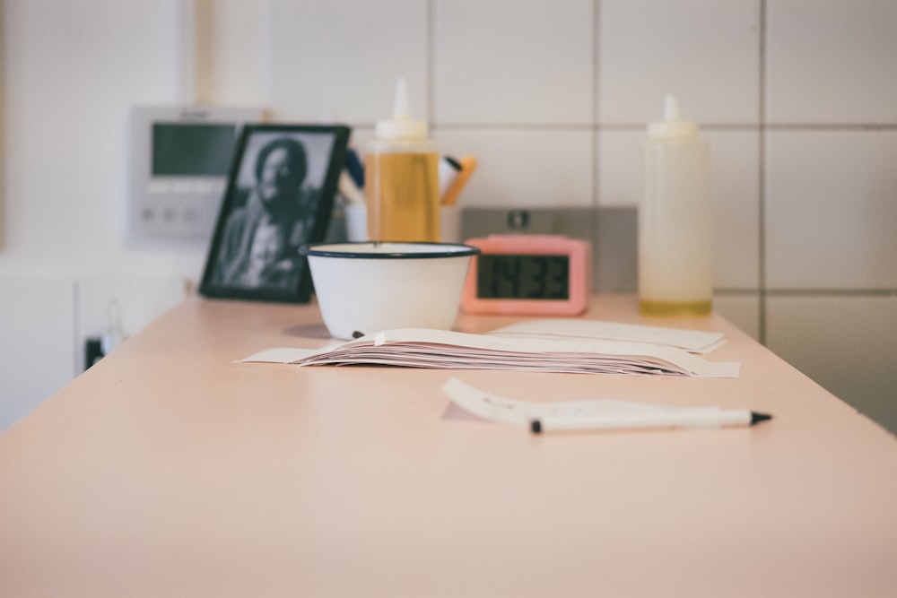 white ceramic cup on white ceramic saucer