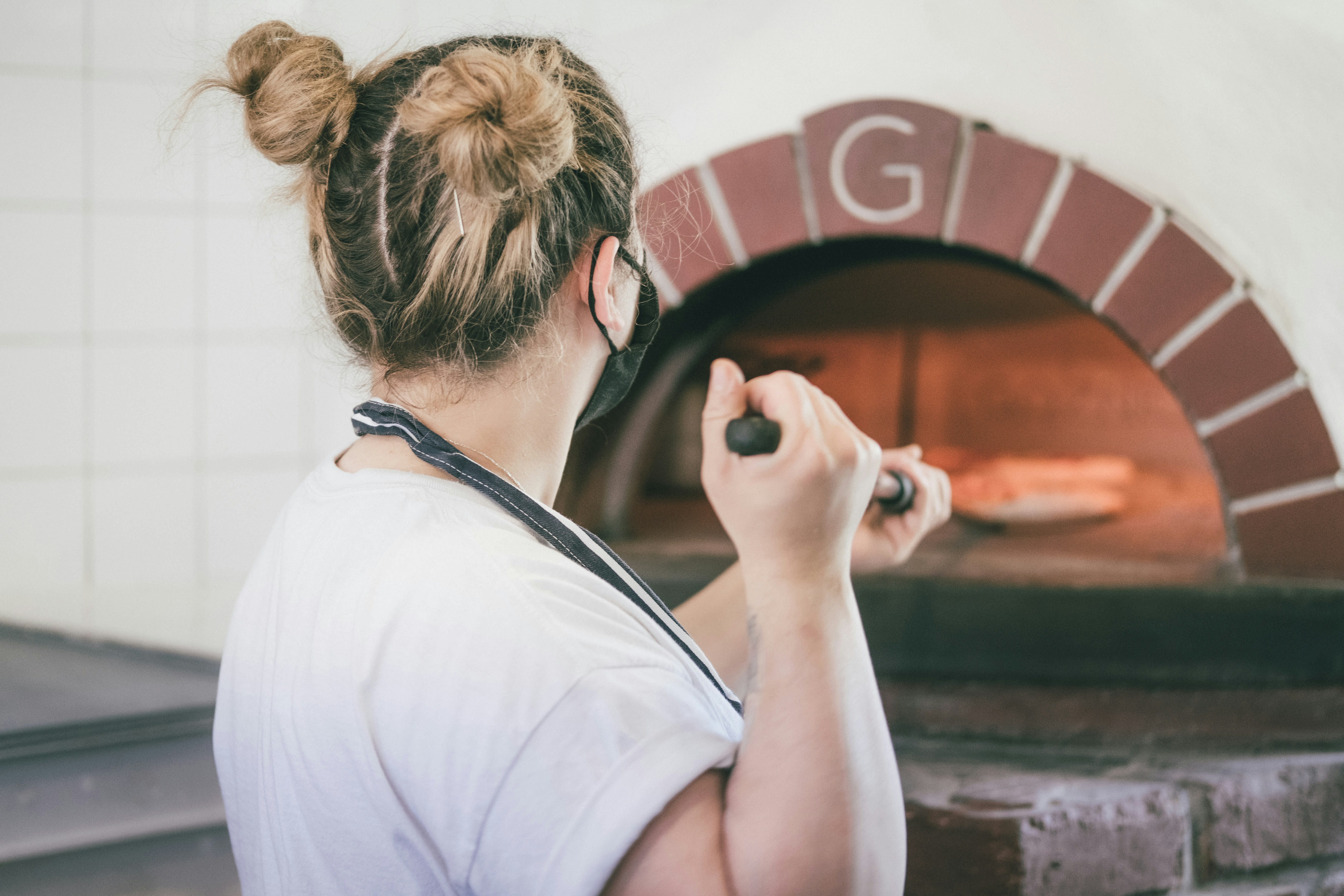 Chef preparing pizza