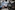 black dslr camera taking photo of city lights