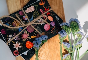 A set of elegant art postcards featuring delicate floral watercolors