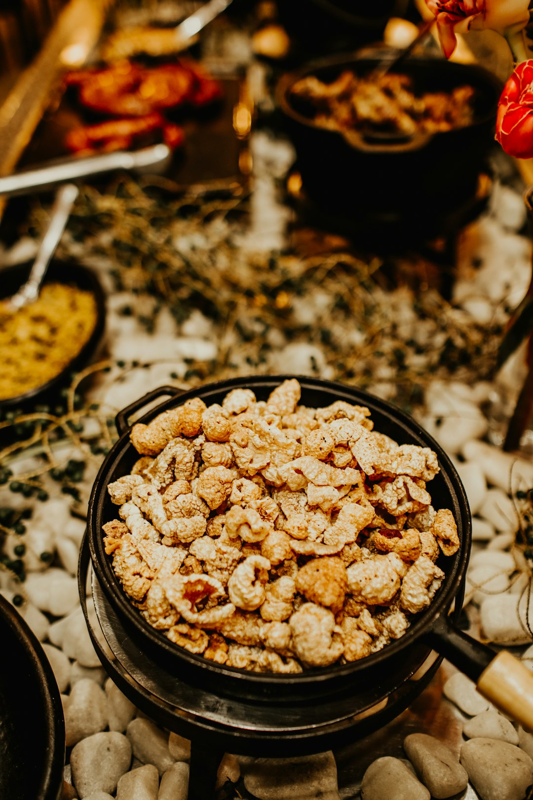 white and brown food on black round bowl