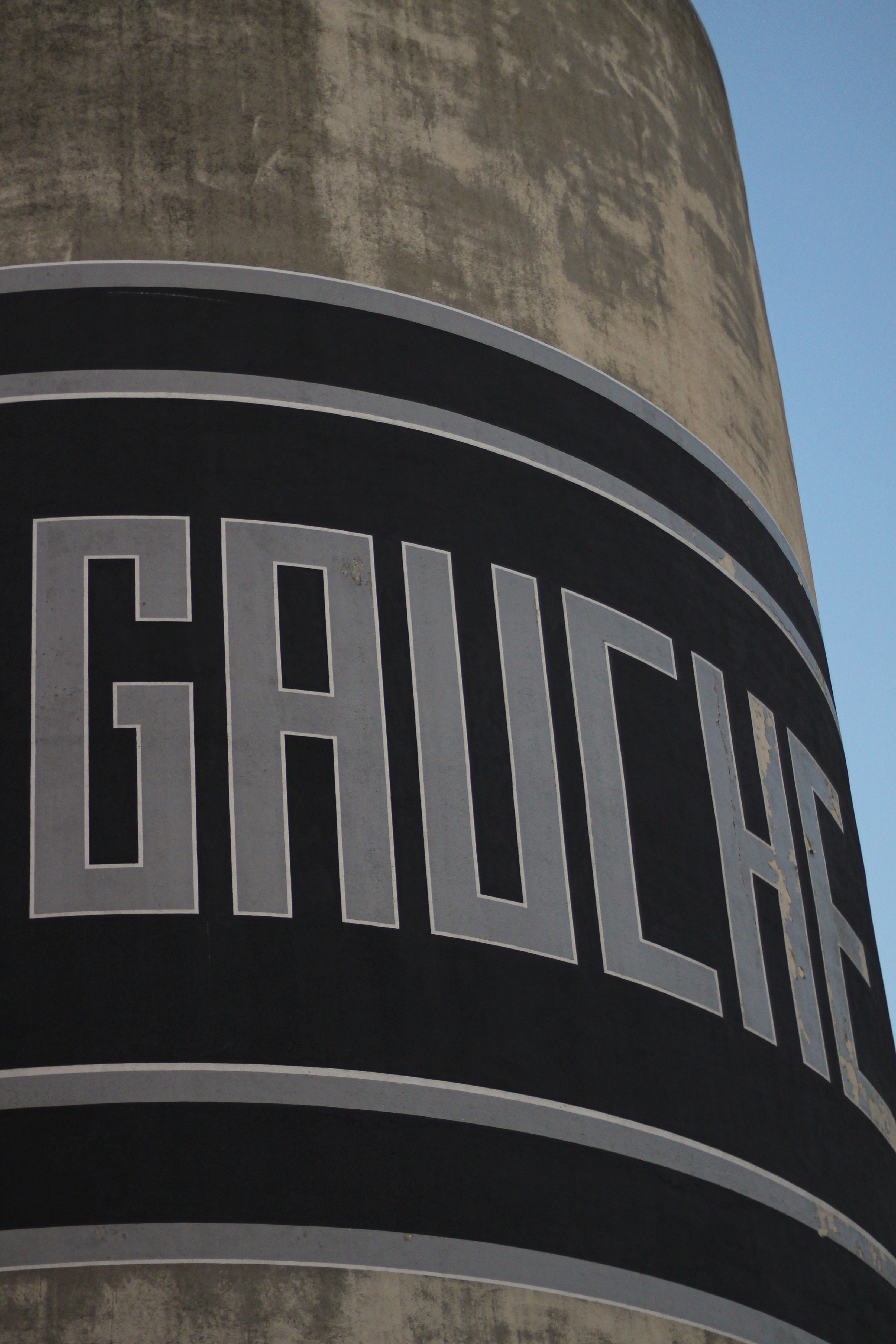 a large black and white sign on a building