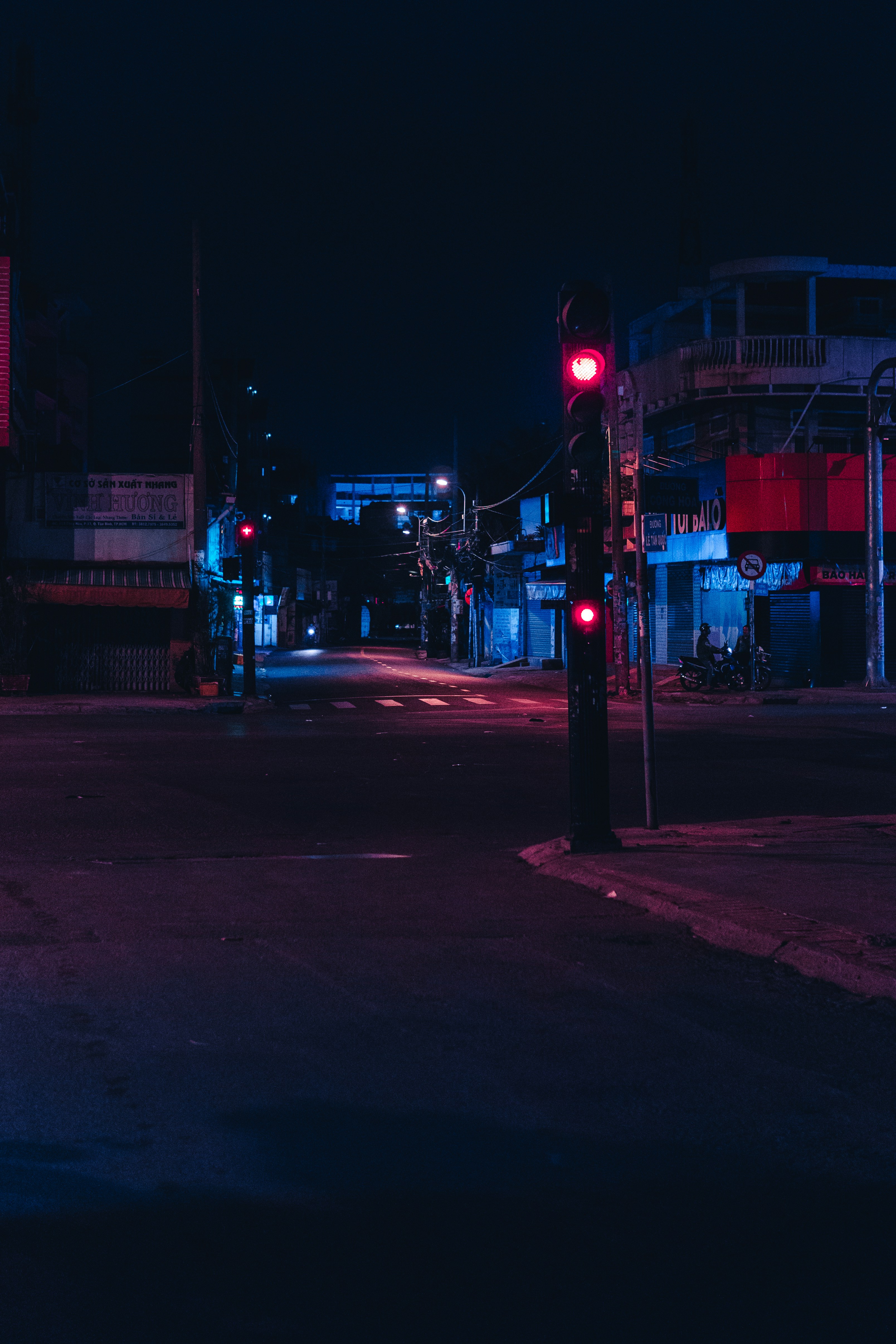red and white street light during night time