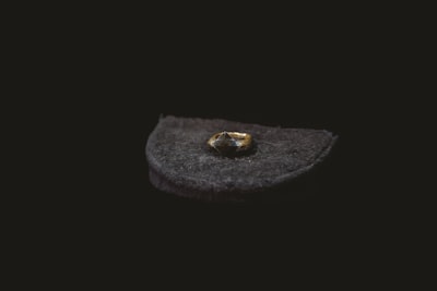 black round stone with black background studio tour drive zoom background
