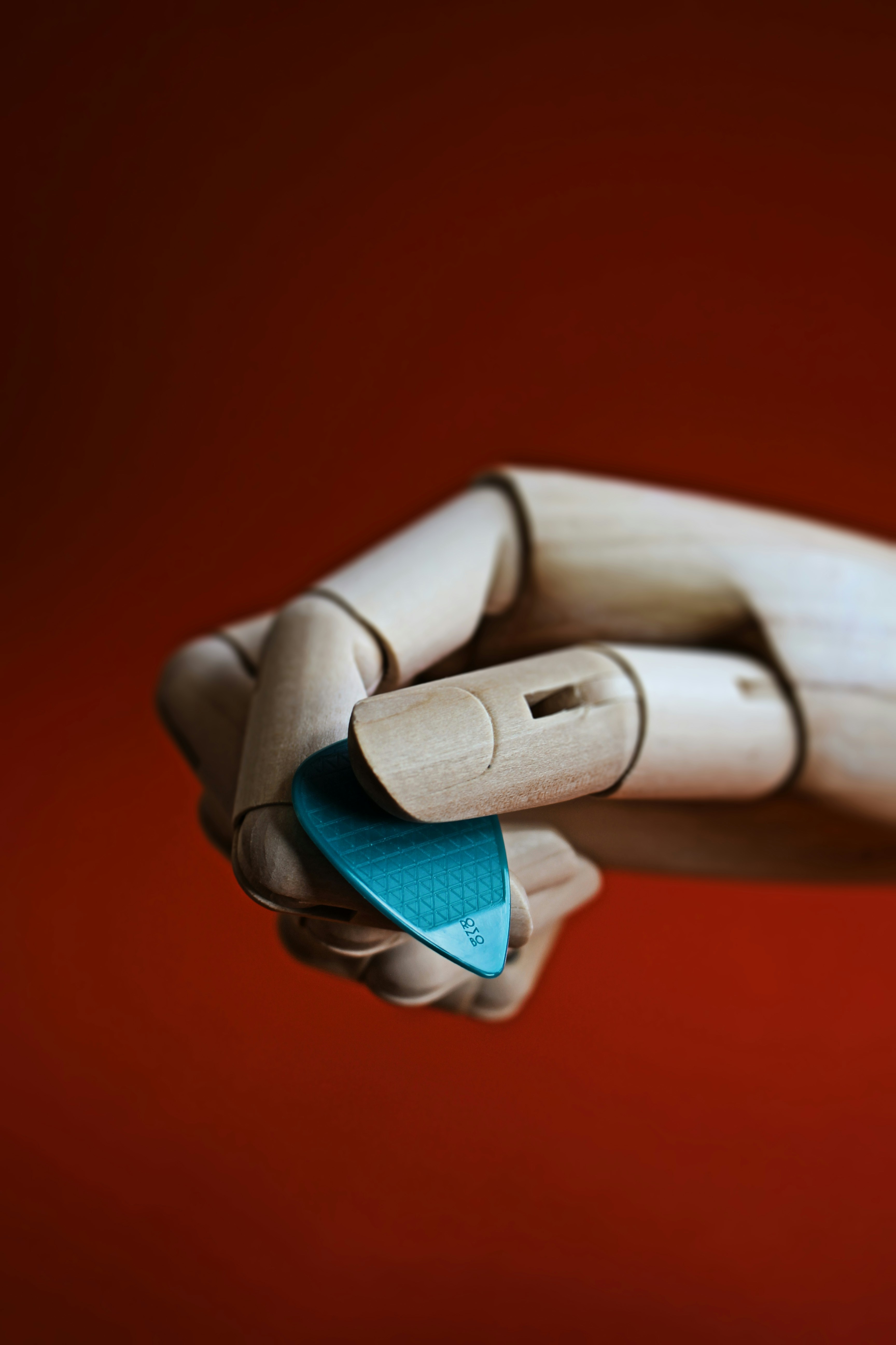 Branimo branded white and blue textile displayed on red textile background