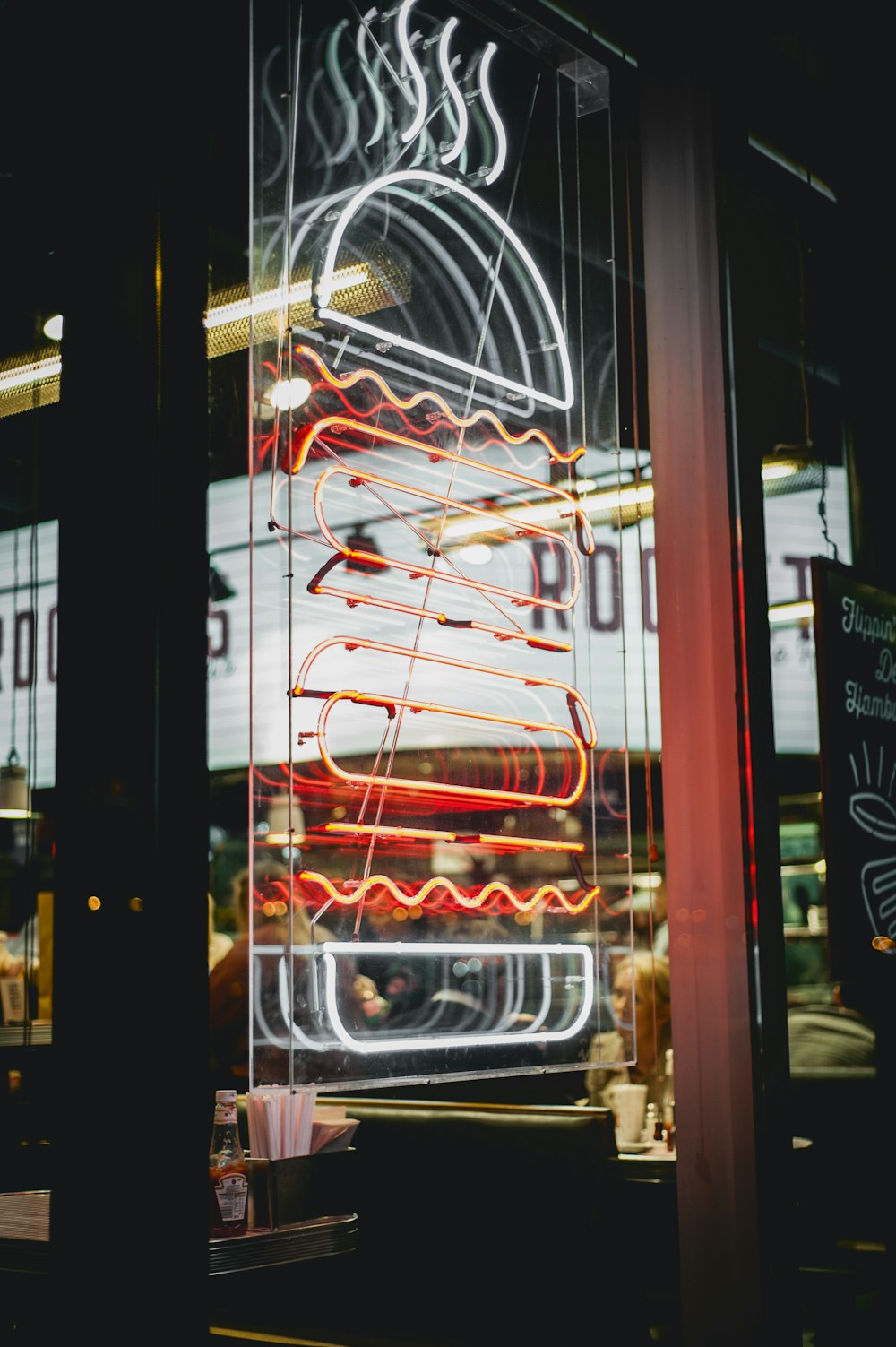 white and red neon light signage